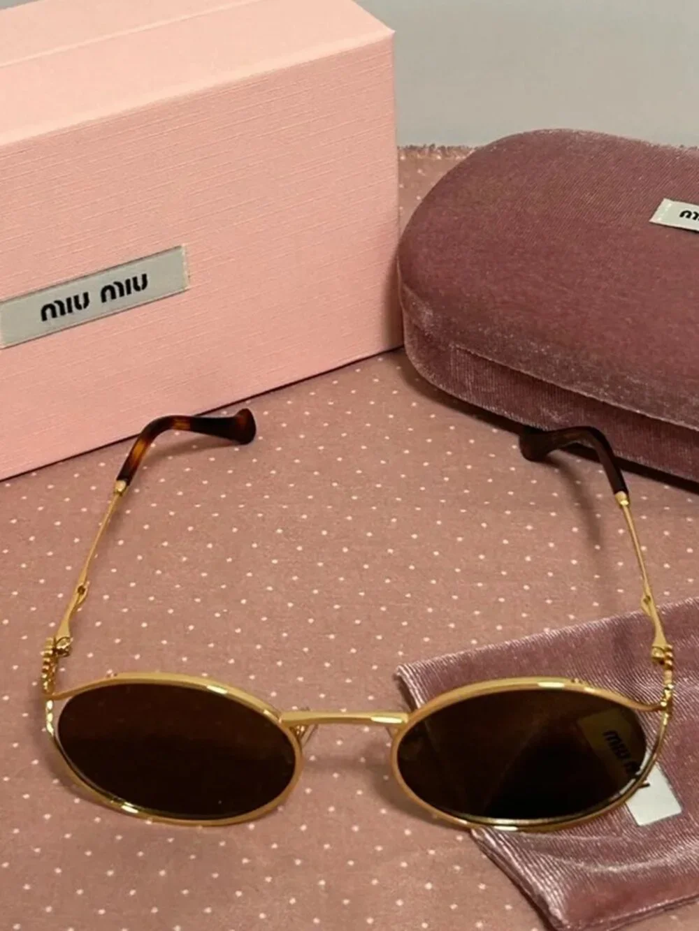 Miu Miu Gold Round Metal Sunglasses with Dark Lenses